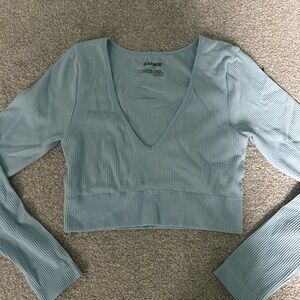 Garage Women's Blue Ribbed V-Neck Top